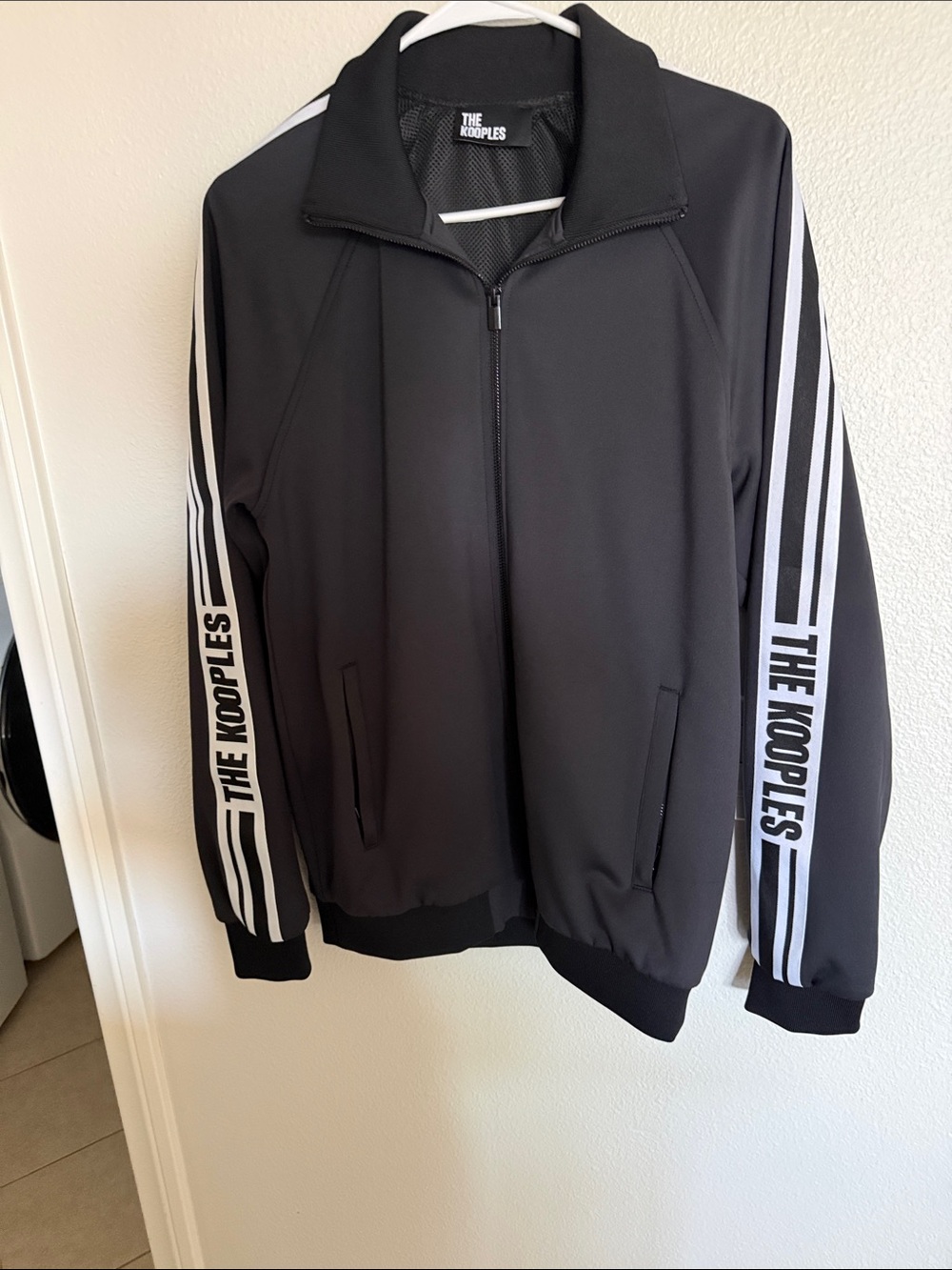 The Kooples Black Track-Style Bomber Jacket with White Sleeve Stripes